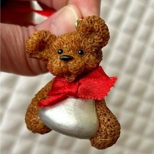Hershey Kiss Teddy Bear ornament. Cute bear holding a chocolate Hershey kiss.